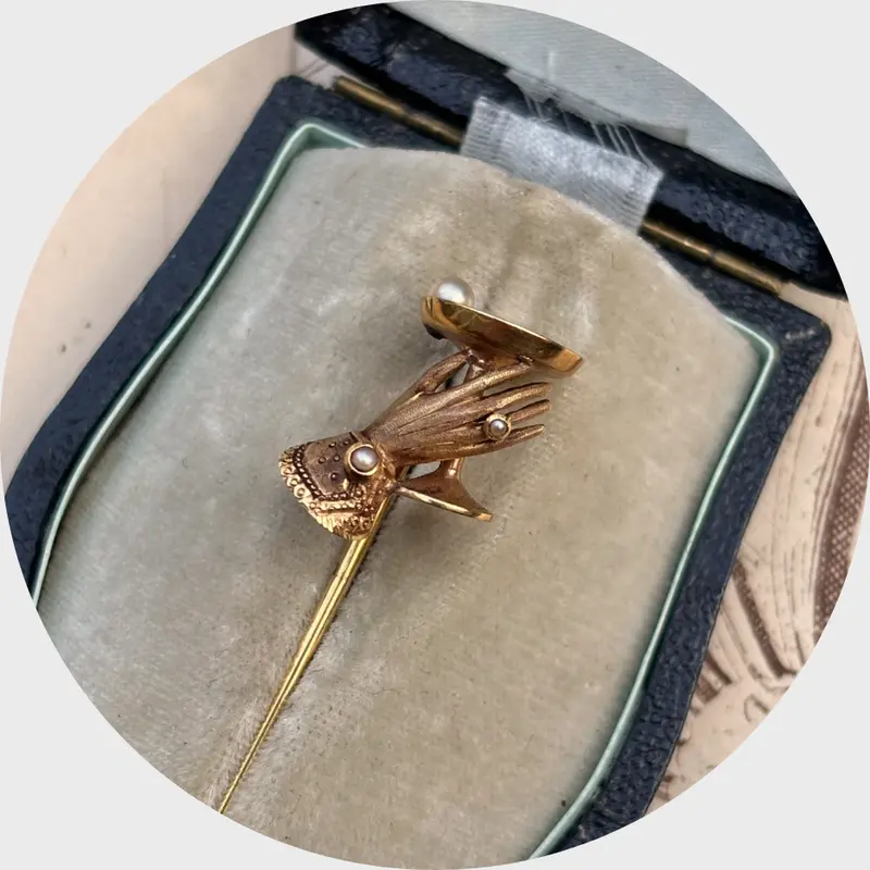 Antique Stickpin of a Hand with Cocktail