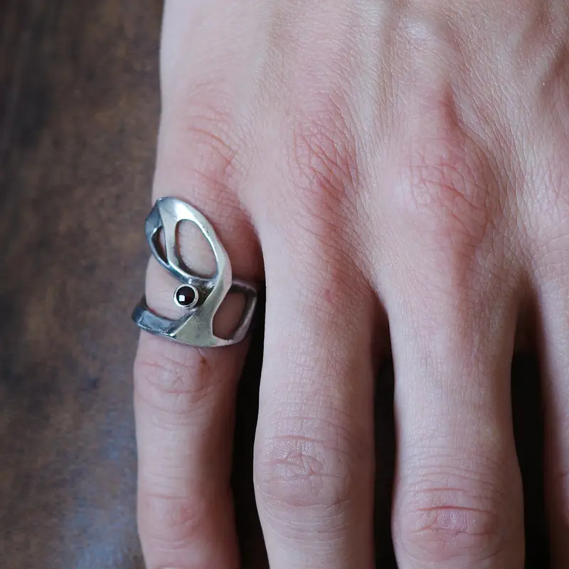 Brutalist wrap ring with garnet