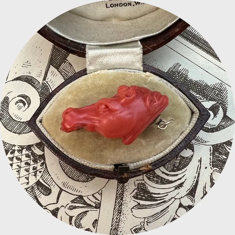 Carved Coral Horse Head Pendant
