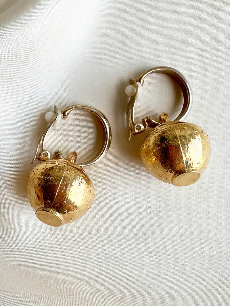 Gouden clip oorbellen met hanger