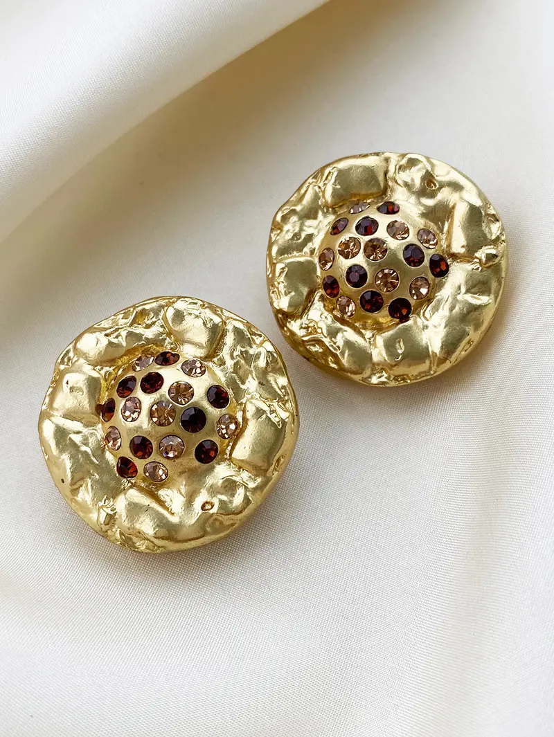 Vergulde clip oorbellen met strass