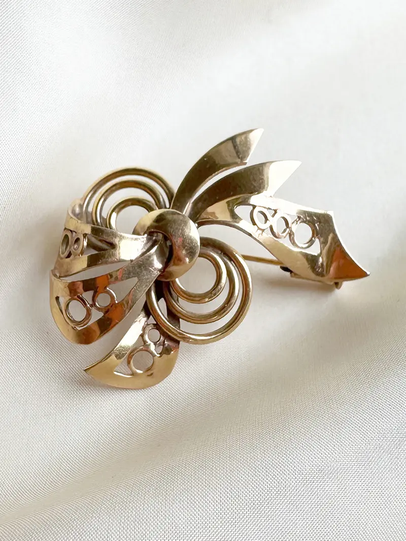 Vergulde fantasie broche