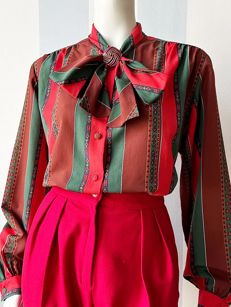 Vintage gestreepte strikblouse