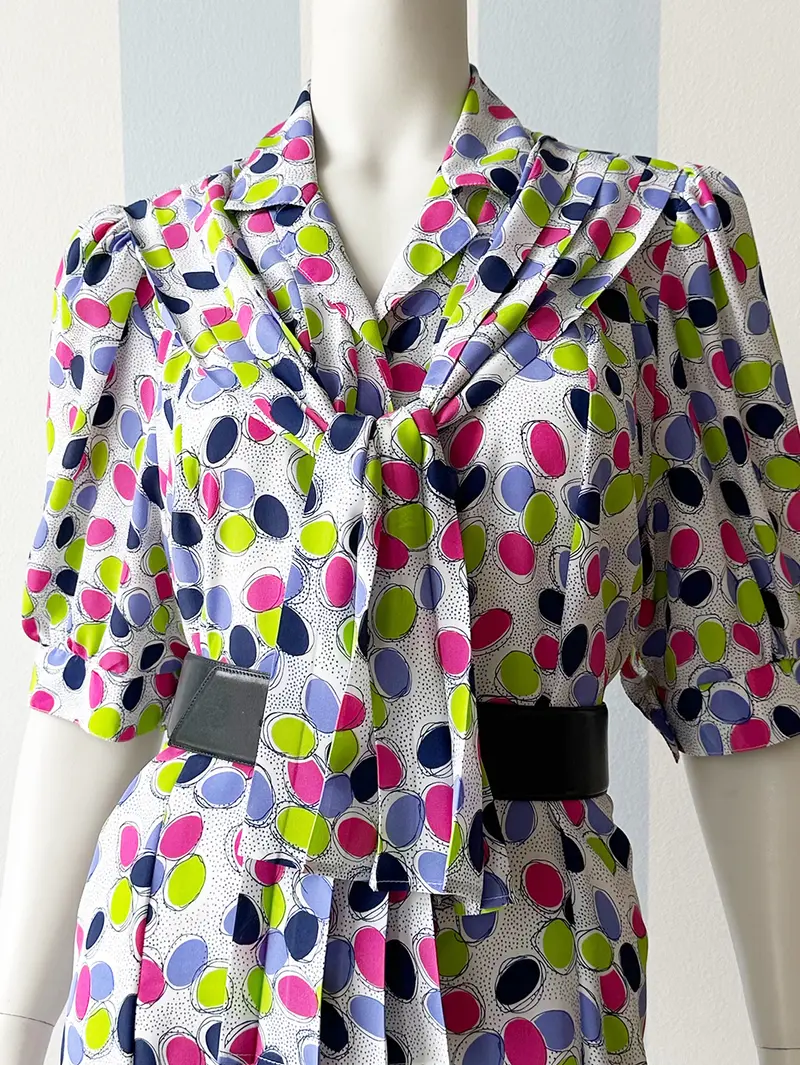 Vintage printjurk met geplisseerde sjaal